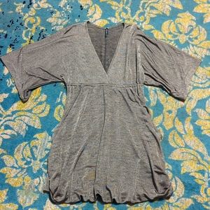 Shimmery plunge dress with kangaroo pockets